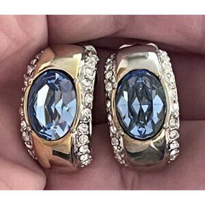 Vintage 90s Mogul curved gold tone blue & clear rhinestone clip on earrings